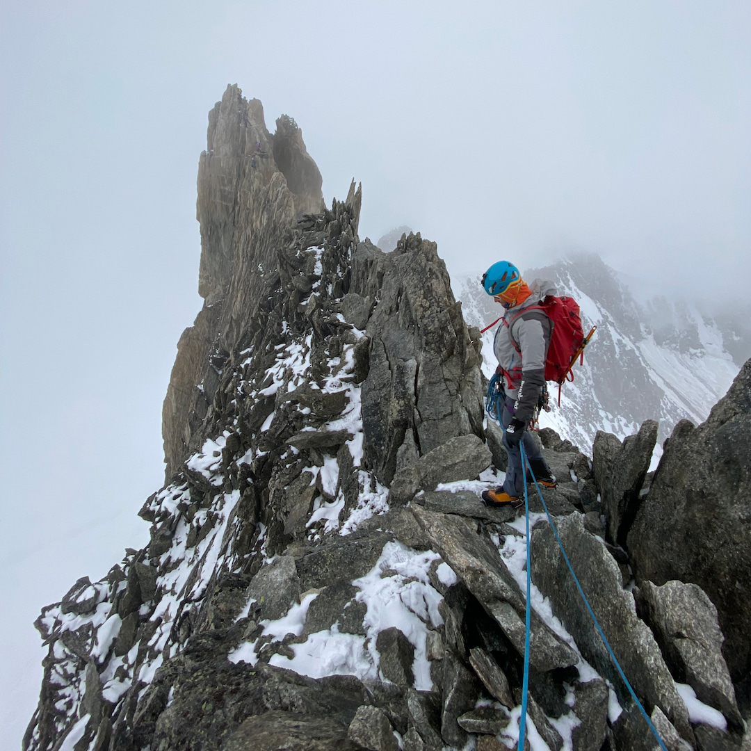 Two guides on a summit